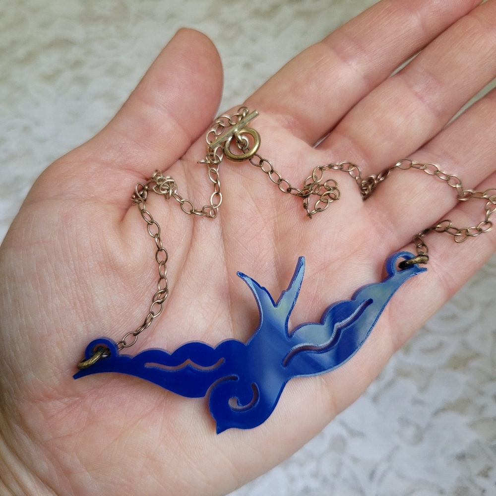Blue bird cut out necklace